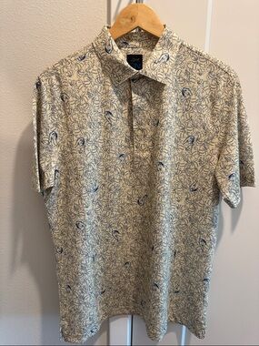 Greg Norman Men's Short Sleeve Polo Shirt in Cream with Monstera Tropical Print